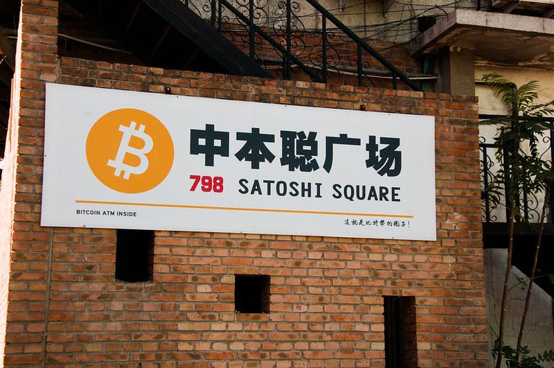 Posters like this one advertising Bitcoin ATMs and meeting spaces are becoming common in China.